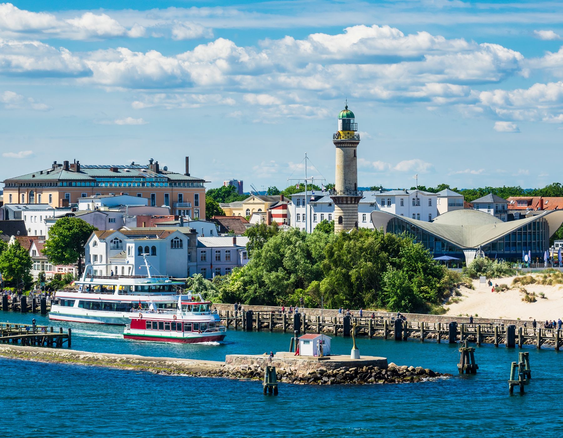 View to the lighthouse in Warnemuende, Germany.